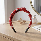 Styled look of printed knot hairband