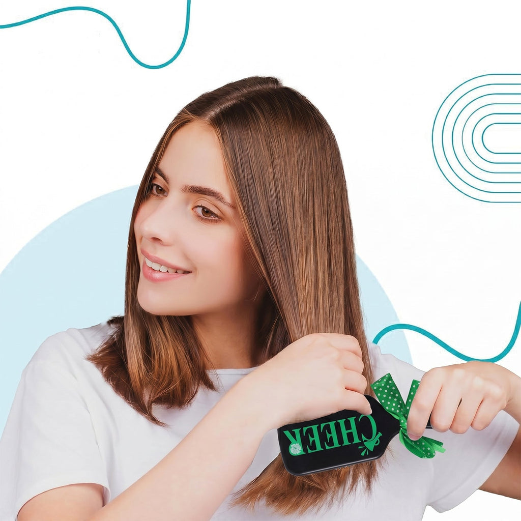 Kids detangling hair comb with colorful cartoon print and lightweight design.