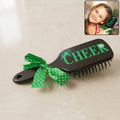 Kids printed hair brush with cute ribbon bow handle, soft bristles for gentle detangling.