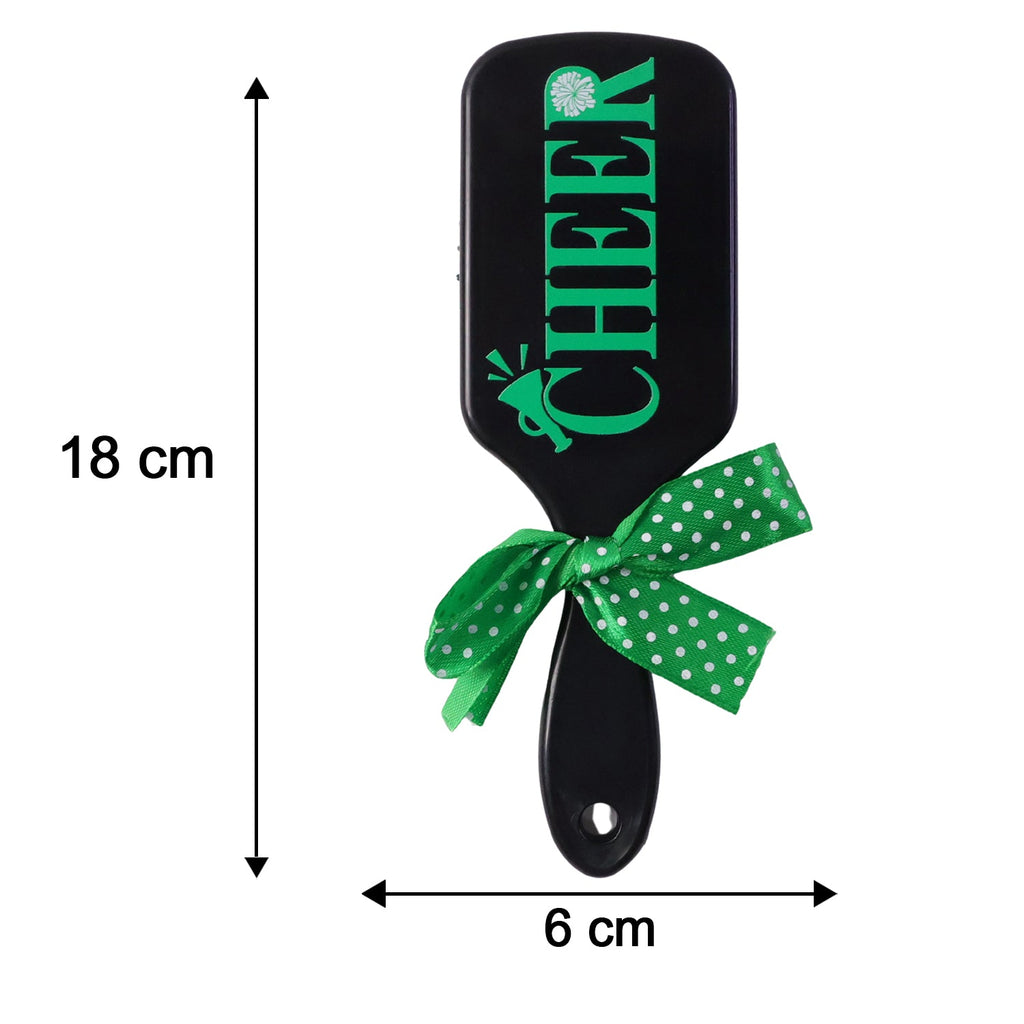 Close-up of kids printed hair brush with soft bristles for gentle styling.