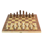 A game in progress on the Folding Wooden Chess Board, with hands moving chess pieces.