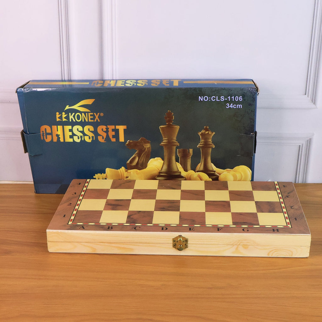 Lifestyle shot of an individual engrossed in a game on the portable Folding Wooden Chess Board.
