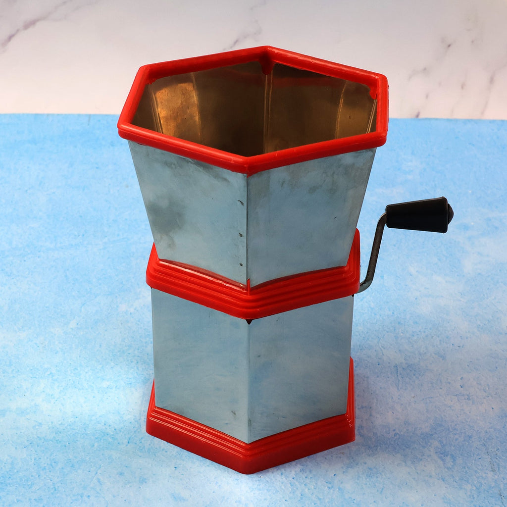 Hand-operated vegetable cutter with sharp stainless steel blades