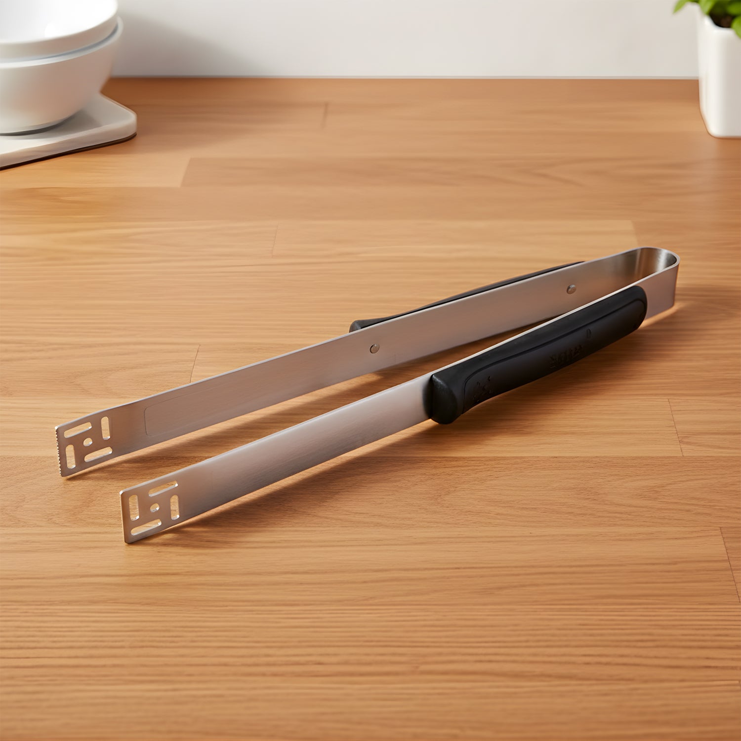 Ergonomic handle of stainless steel chimta for safe food handling