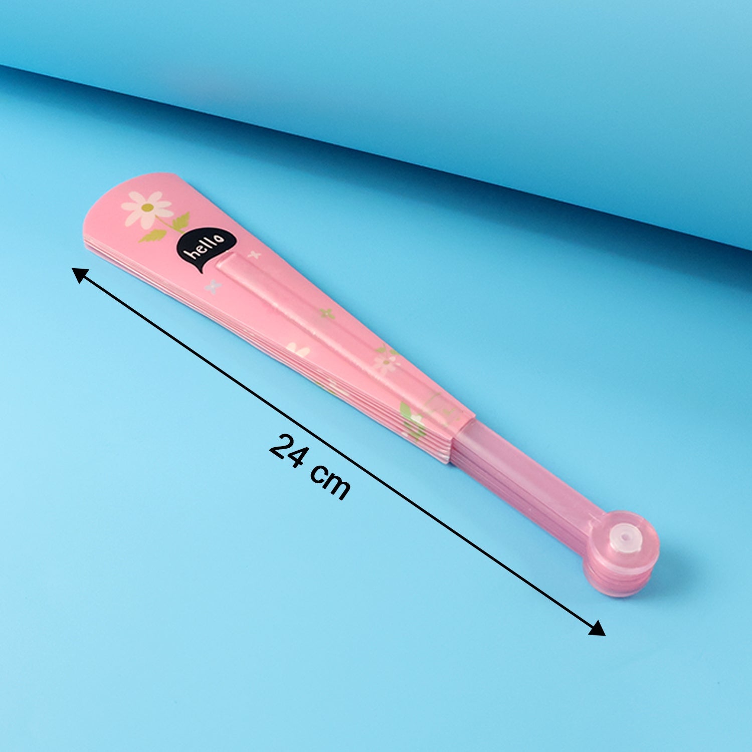 Close-up view of floral print and rib details on foldable fan