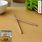 A pair of premium stainless steel reusable chopsticks on a clean background.