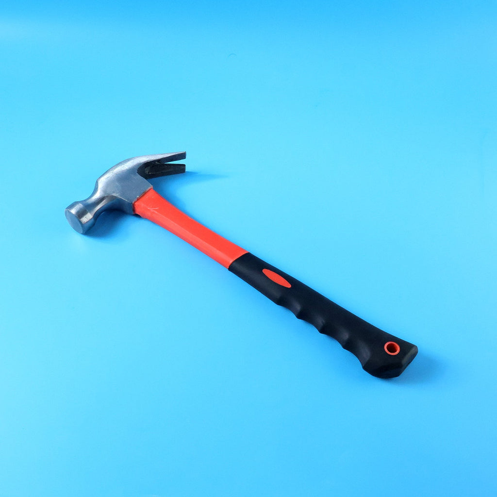 Woodworking and repair hammer with ergonomic grip