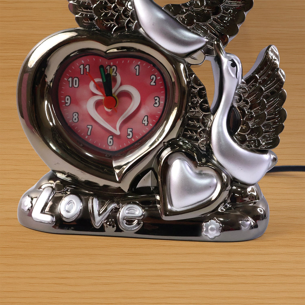 Romantic swan couple table lamp providing ambient bedroom lighting