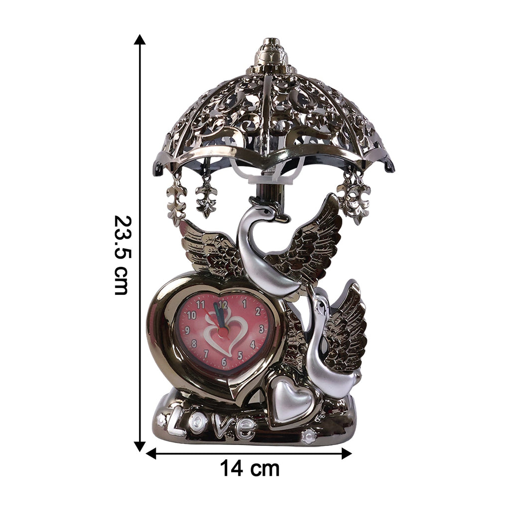 Decorative table lamp with swan couple design and clock