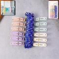 Clothesline rope with 12 pastel clips for laundry drying