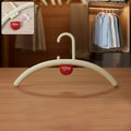Anti-slip plastic clothes hanger with built-in fragrance holder for wardrobe organization