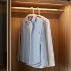 Curved anti-slip clothes hanger designed to preserve garment shape and prevent slipping