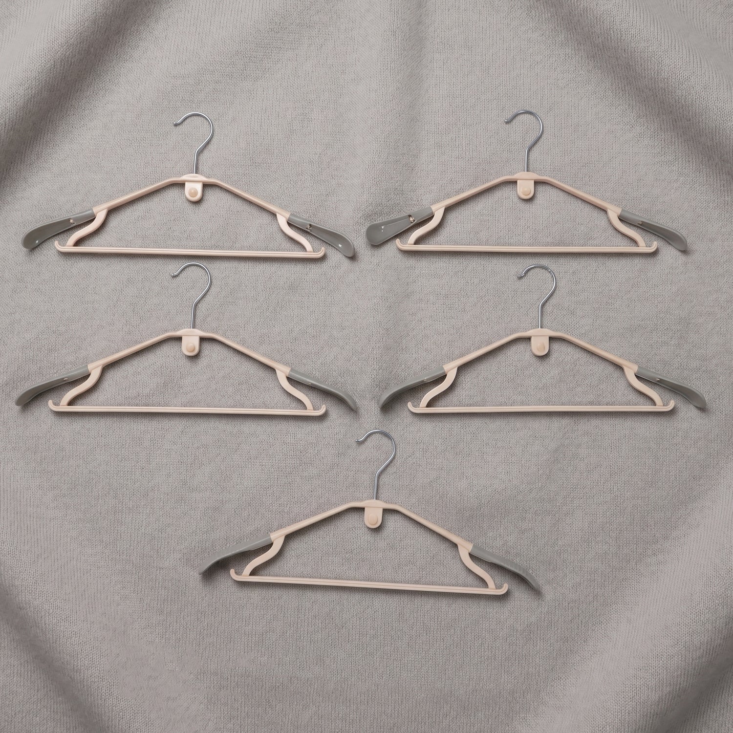 Sturdy plastic clothes hangers for daily wardrobe use
