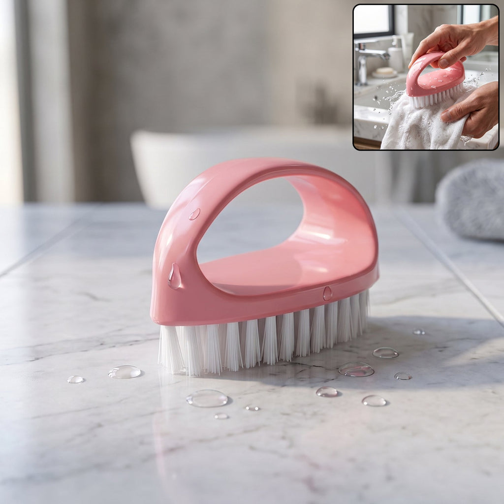 Pink handled scrubbing brush designed for deep cleaning tasks