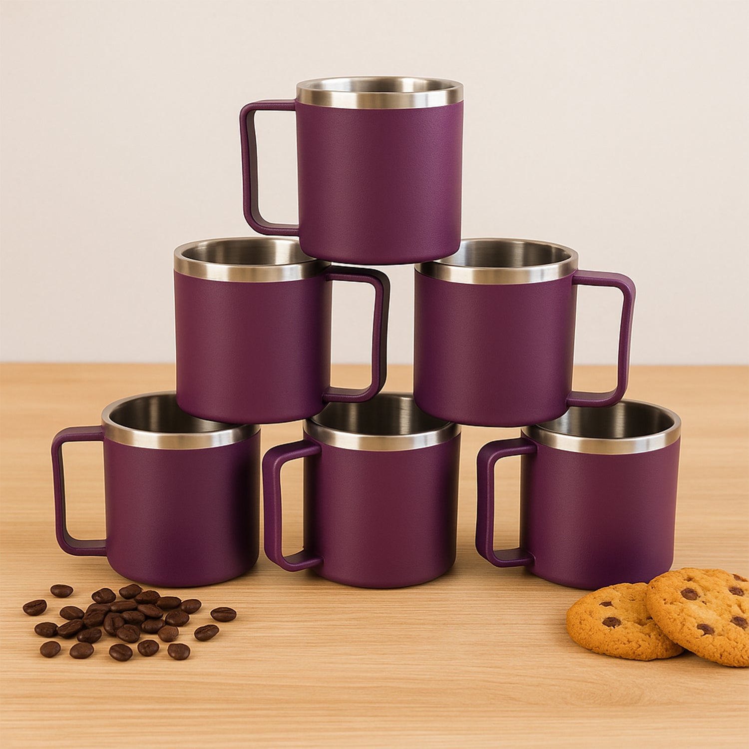 Single coffee mug from set highlighting ergonomic handle and steel interior