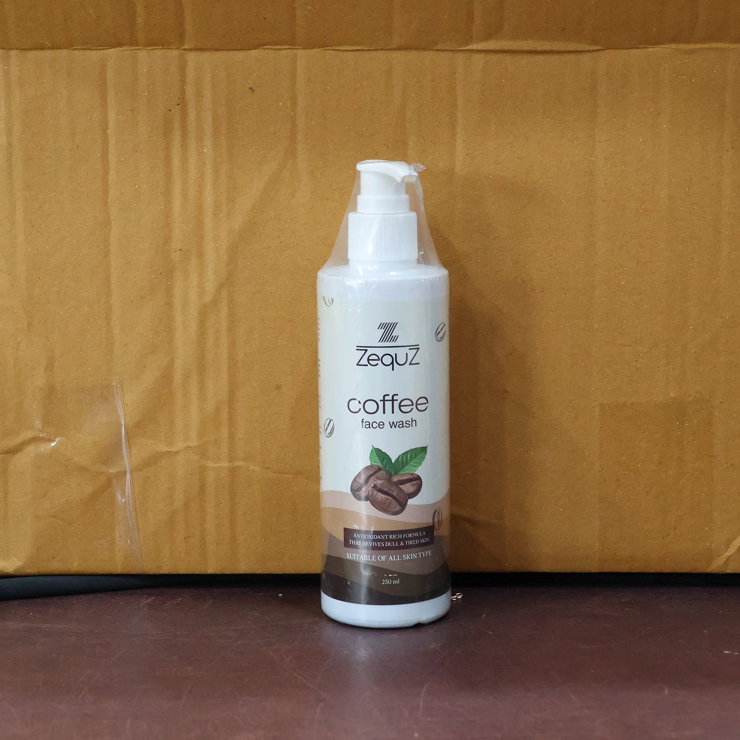 Lifestyle image of Zequz Coffee Face Wash bottle showcasing antioxidant benefits