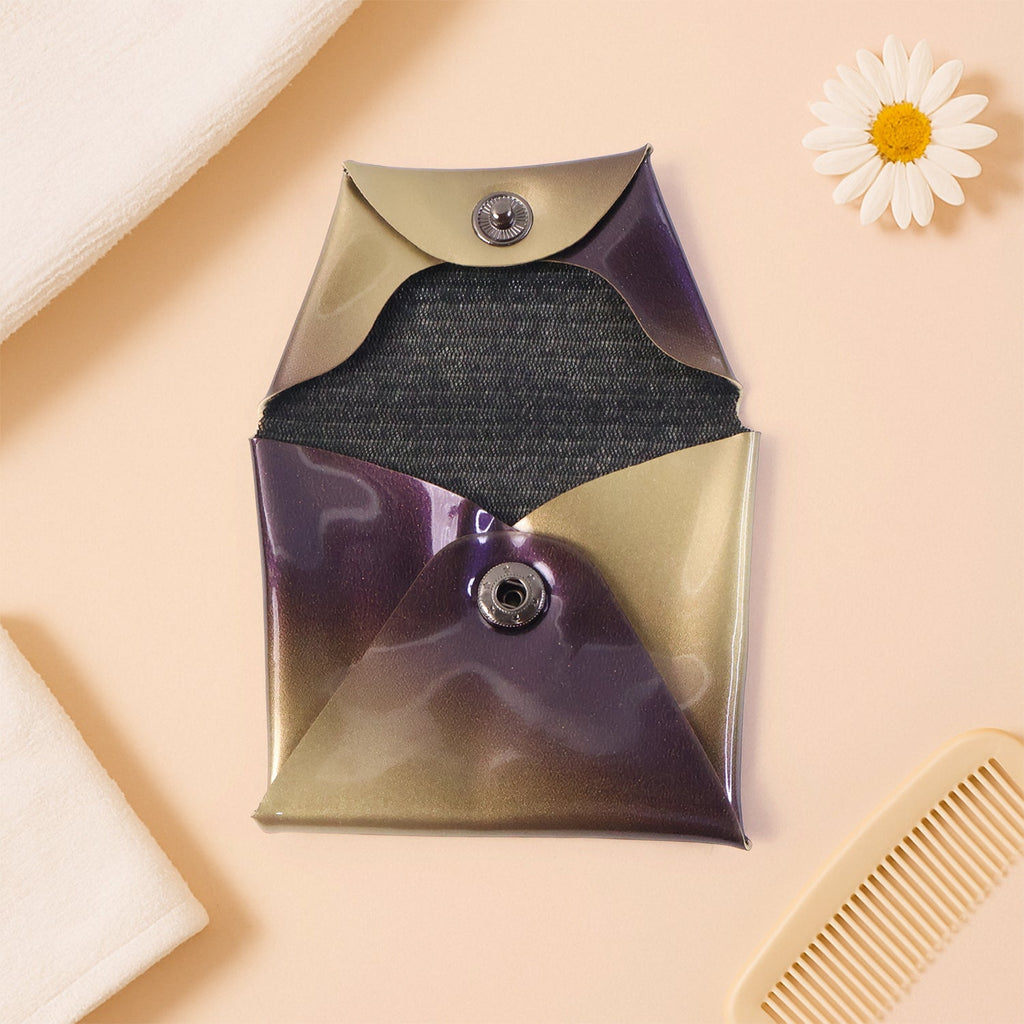 Folded compact coin pouch in hand for portability