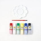 Creative kids art supplies including watercolour paints