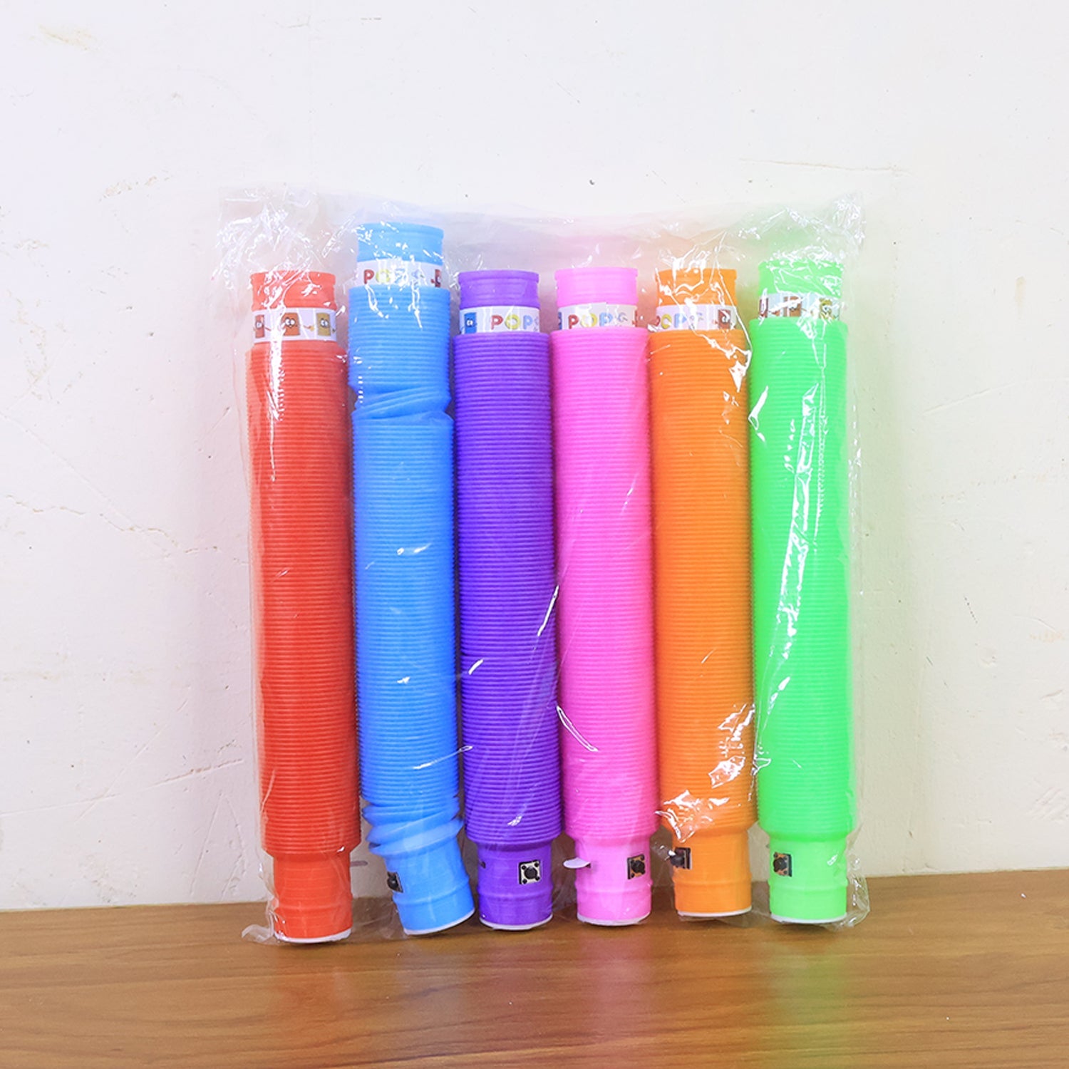 Fully extended LED Glow Pop Tube Fidget Toy showing flexibility