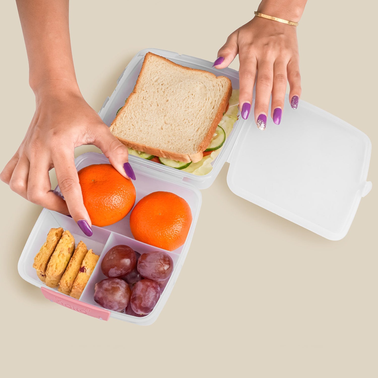 Compact lunch box with multiple compartments for organized meals