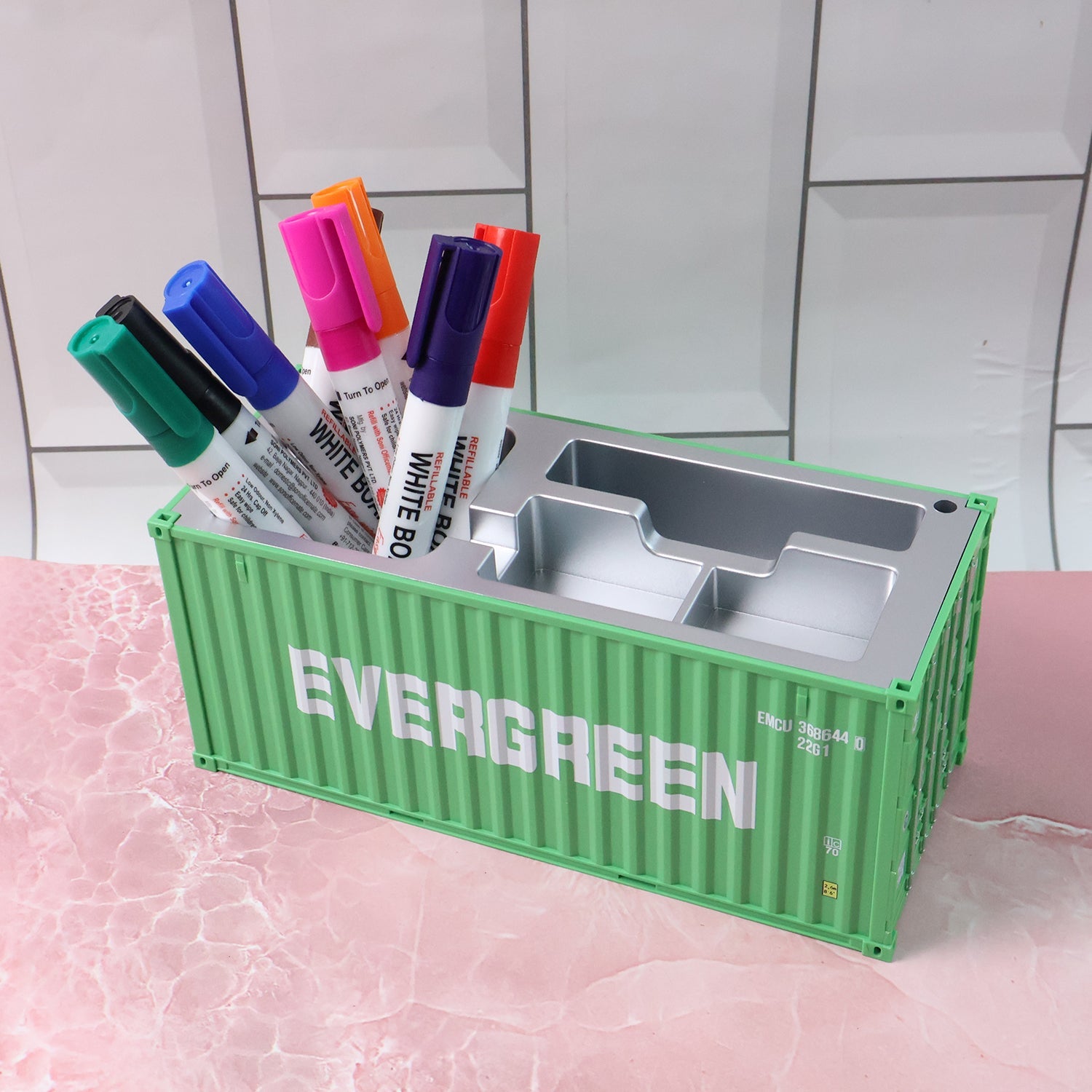 Container-style desk organizer with multiple compartments for small items.