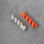 Flexible spiral cable protector in an uncoiled state, ready for installation.