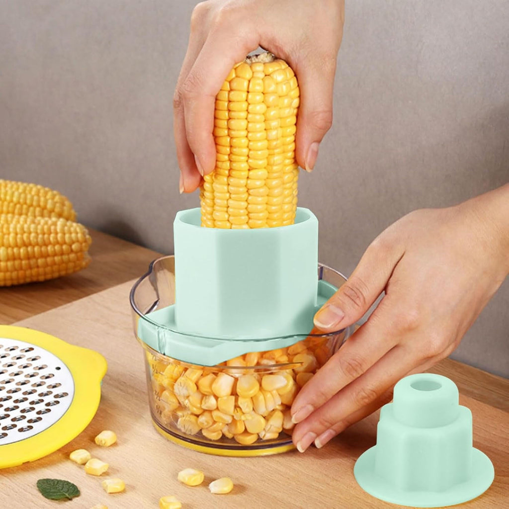 Close-up of manual vegetable grater blade and corn kernel stripping feature