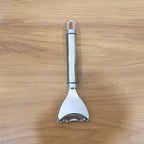 Vegetable skin remover tool with ergonomic handle and sharp blade
