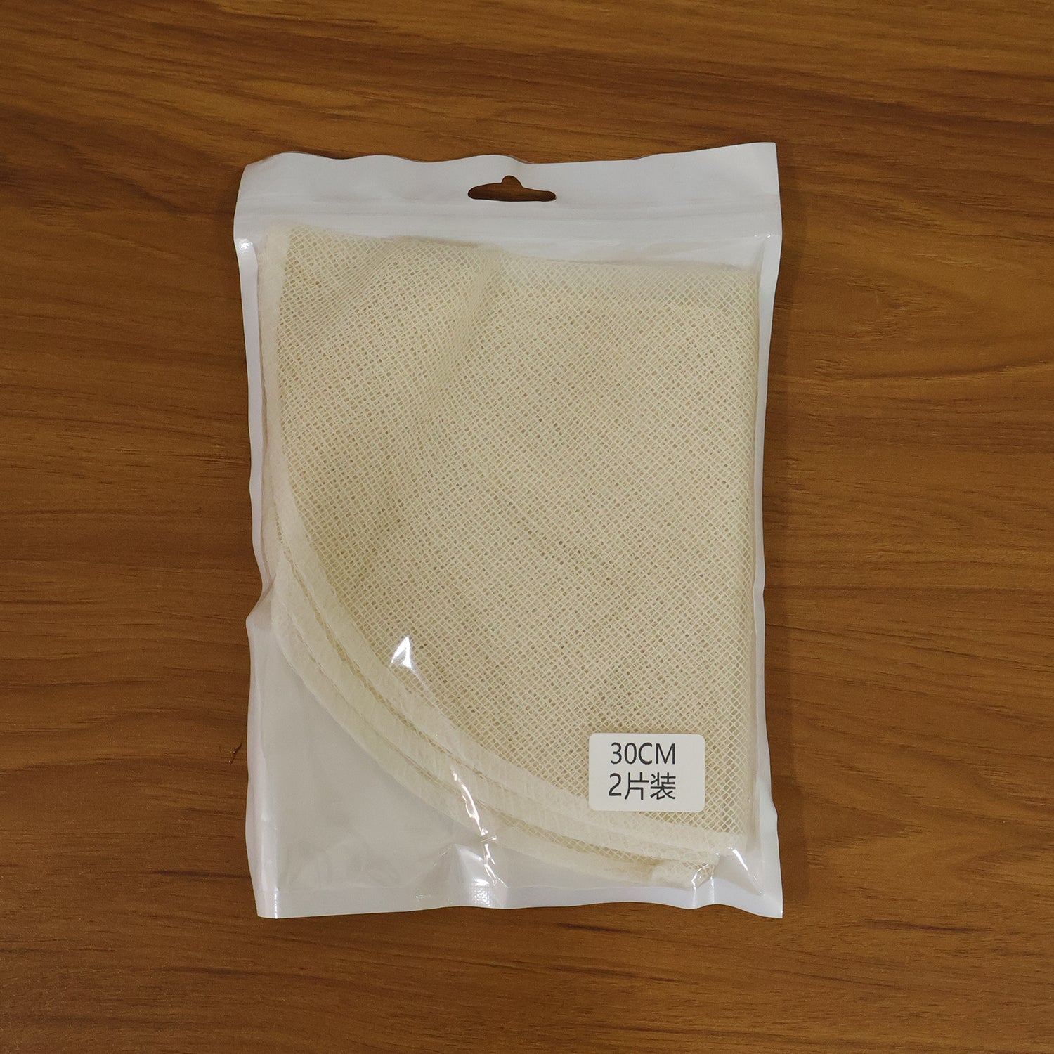 Cotton steam cloth placed in bamboo steamer for cooking