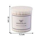 Detailed close-up of a cotton ear bud highlighting cotton tip texture