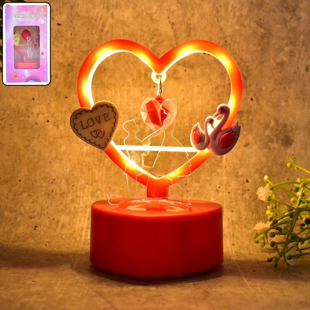 Heart-shaped decorative love showpiece featuring LED hanging heart light in red frame