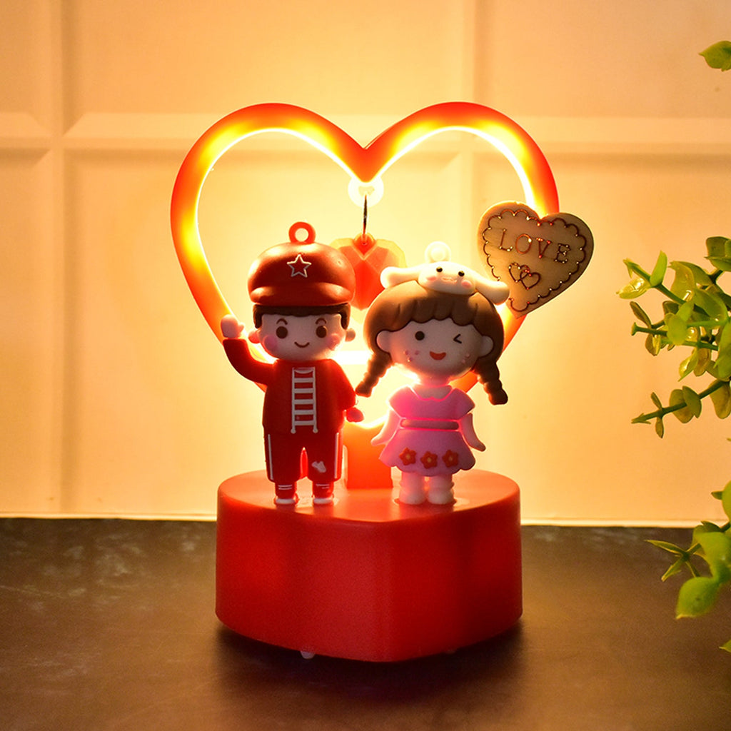 Romantic couple love showpiece with heart frame in glowing LED light