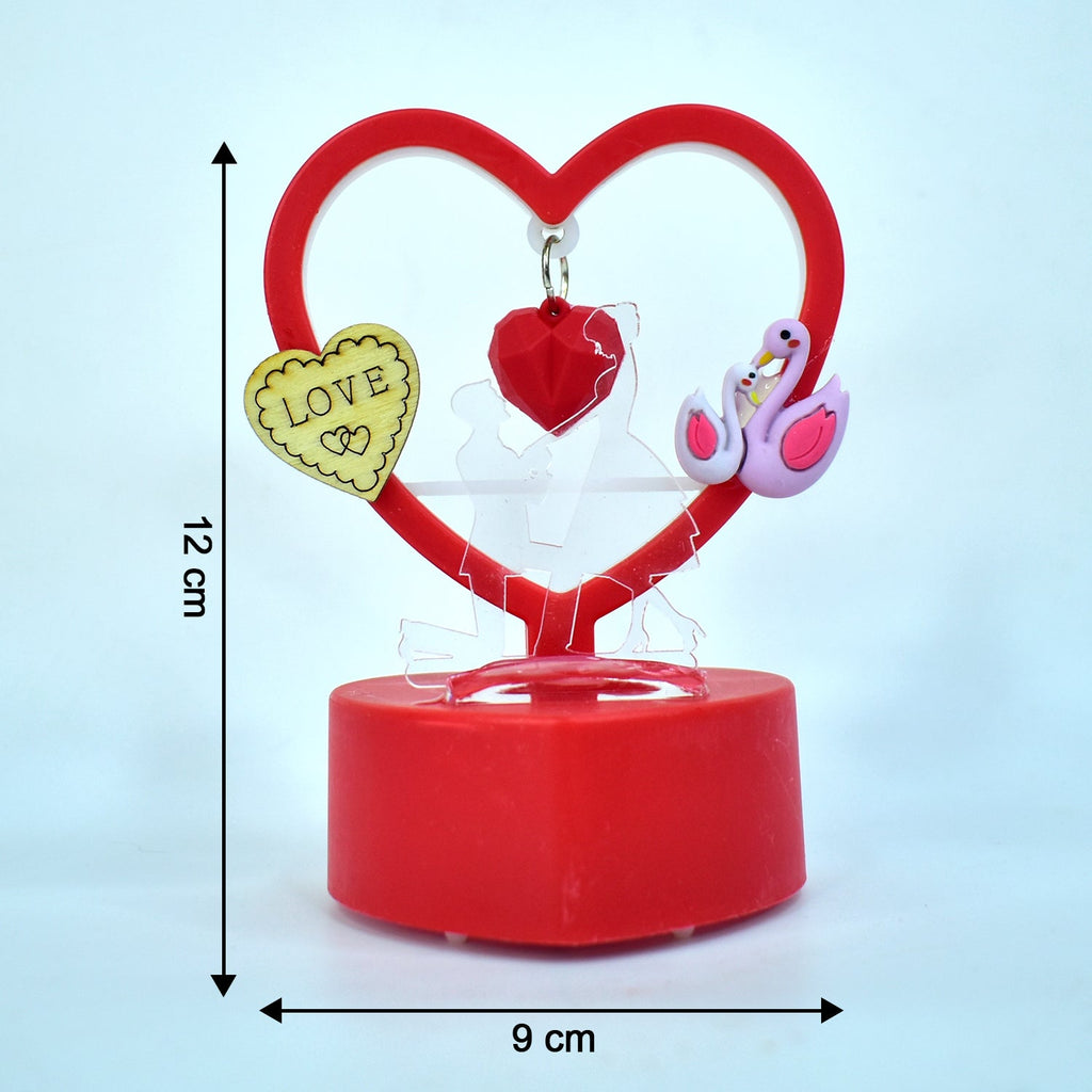 Decorative heart showpiece glowing with warm LED light for romantic decor