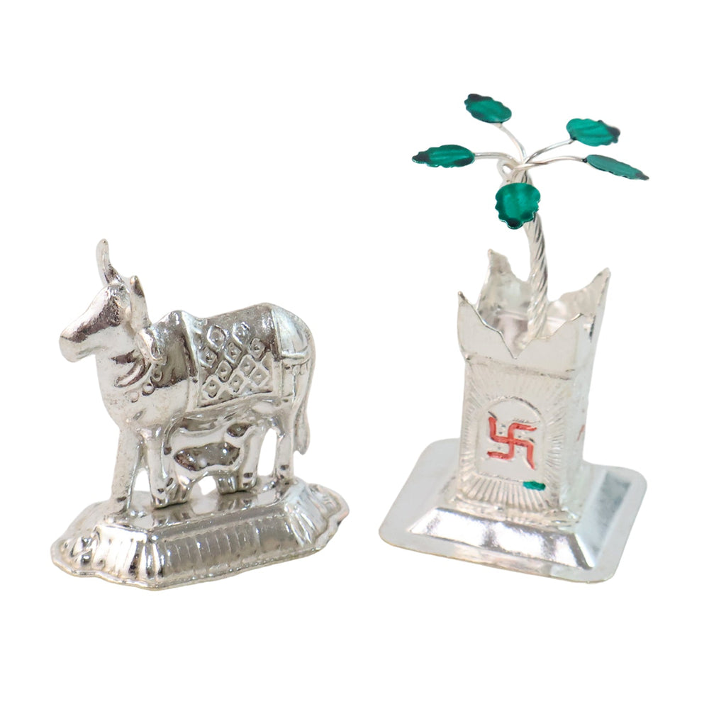 Silver-plated religious Kamdhenu cow and Tulsi plant duo set for mandir decoration