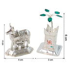 Silver-plated Kamdhenu cow and Tulsi plant pooja idols enhancing home spiritual decor