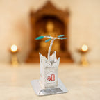 Silver-plated Kamdhenu cow and Tulsi plant pooja idol pair detailed view