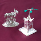 Silver-plated Kamdhenu cow and Tulsi plant divine idols set for festivals and pooja