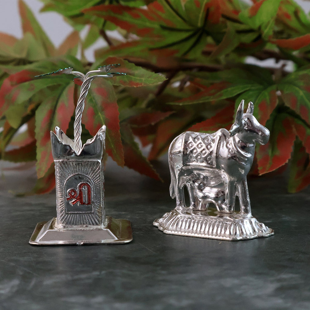 Elegant silver-plated Kamdhenu cow and Tulsi plant pair for religious blessings
