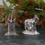 Elegant silver-plated Kamdhenu cow and Tulsi plant pair for religious blessings
