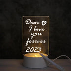 LED Acrylic Message Board Night Lamp glowing with handwritten message in a cozy room