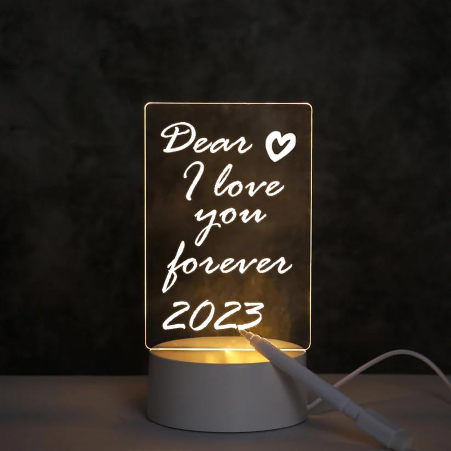 LED Acrylic Message Board Night Lamp glowing with handwritten message in a cozy room