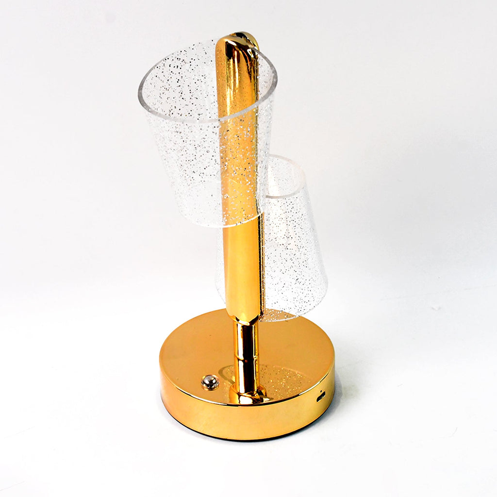 Stylish crystal table lamp featuring warm LED glow and golden metal base