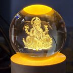 Side profile of the Ganpati 3D Crystal Ball Lamp, highlighting its sleek design and wooden stand.