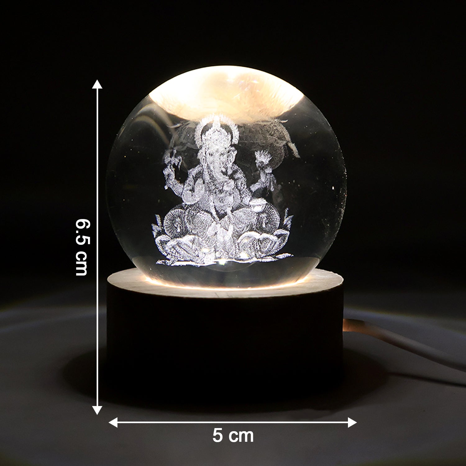 Ambient glow of the Ganpati 3D Crystal Ball Lamp, perfect for spiritual home decor.