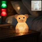 Bear shaped decorative LED night lamp with color-changing glow on table