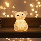 Color-changing bear LED night lamp placed on a wooden tabletop