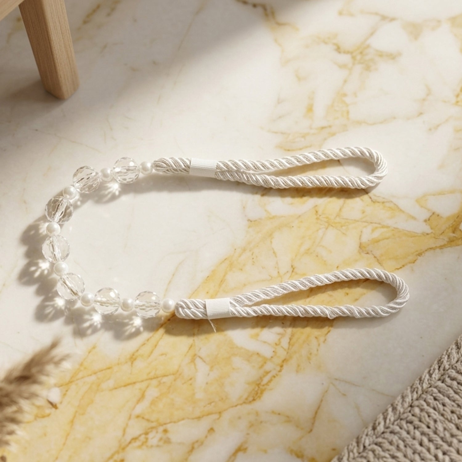 Stylish beaded curtain tieback for various curtain fabrics