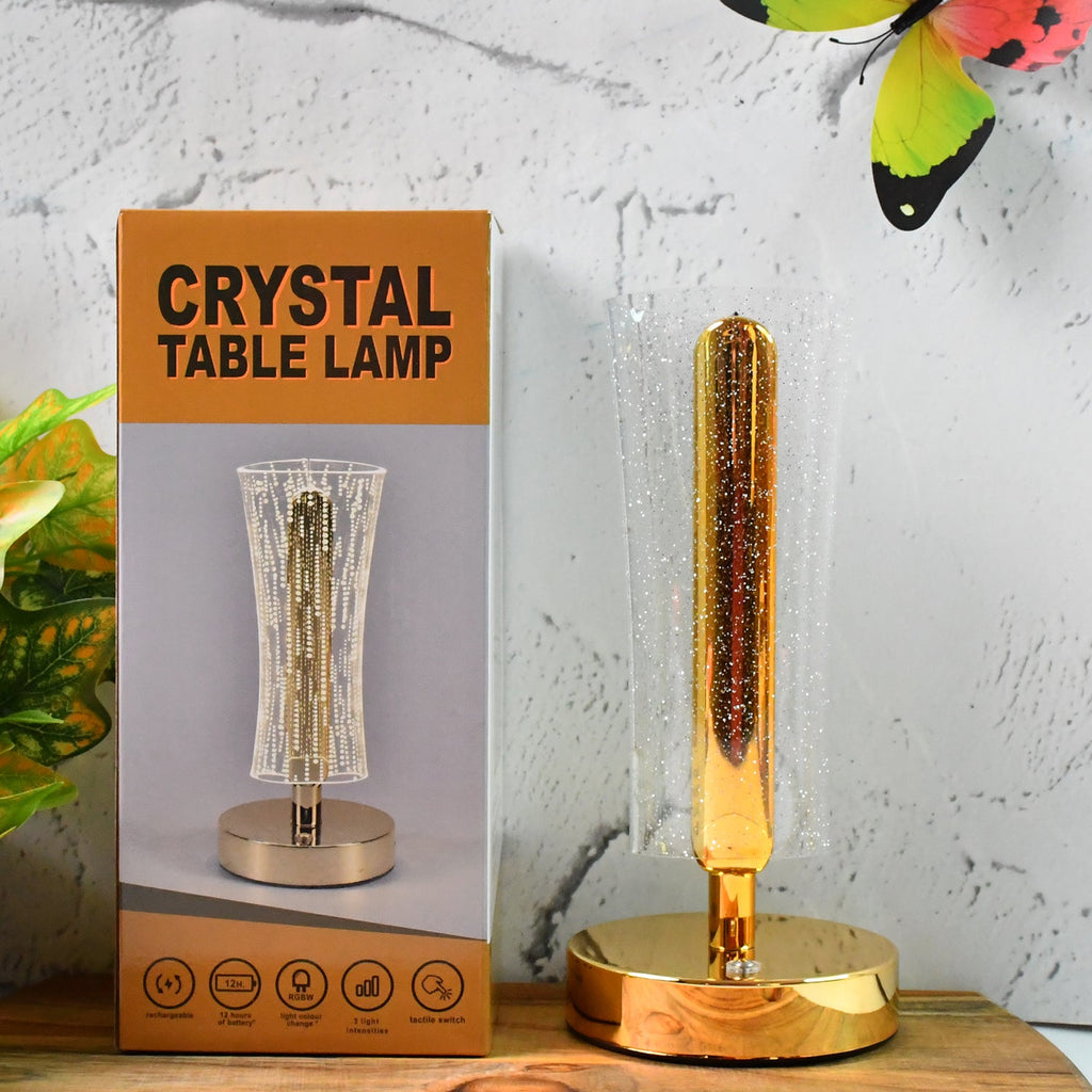 Side view of crystal table lamp glowing warmly with USB powered LED