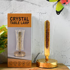 Side view of crystal table lamp glowing warmly with USB powered LED