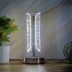 Crystal table lamp showcasing warm light and elegant golden base design